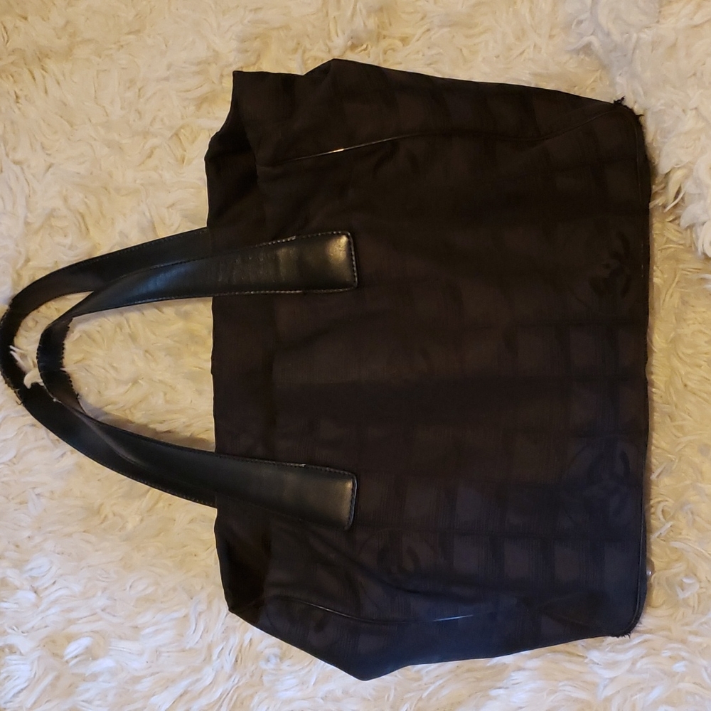 Brown nylon authentic Chanel travel line tote!